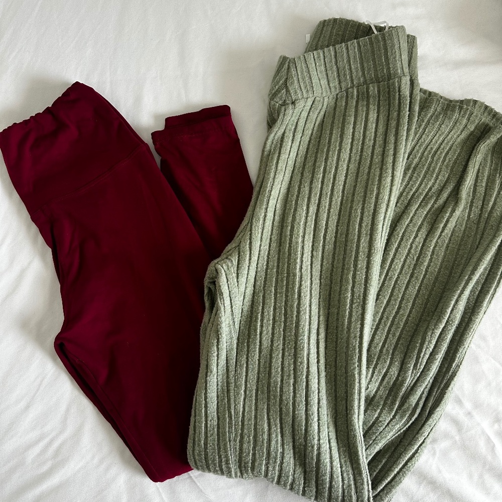 Two pairs of stretchy pants , flared and straight leg